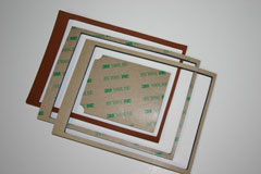 Acrylic adhesive-backed silicone gaskets