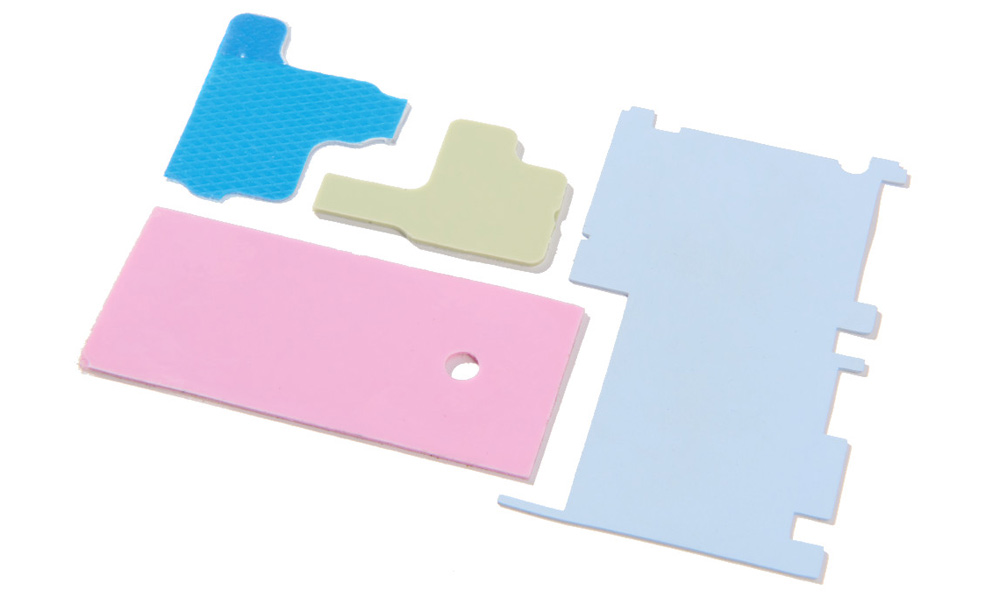 Green, pink, and blue thermal gap pad gaskets