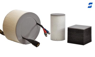 Port plug shown with wire harness installed along with cylindrical and cubic ESD coated plugs 