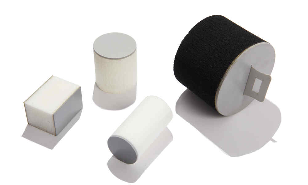 Chamber port plugs shown in various cylindrical sizes, esd coated e-plug with pull handle