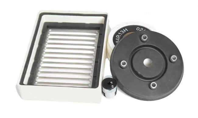 Insert molded parts with steel compression stops and vents and plastic in place
