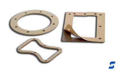 Conductive rubber EMI gaskets with peel and stick adhesive backing 