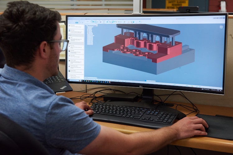 Engineer working on digital drawing