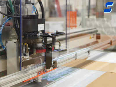 Flash cutter working on cutting parts, wide angle shot