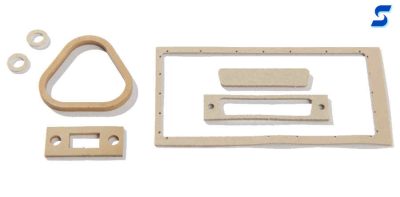 Variety of circular, triangular, and window tan, silver aluminum filled fluorsilicone gaskets 