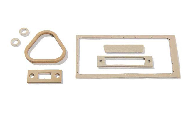 Various tan, silver aluminum filled gaskets 