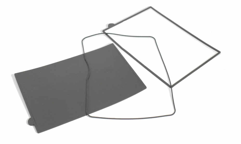 Narrow edge wall and kiss cut touch screen gaskets